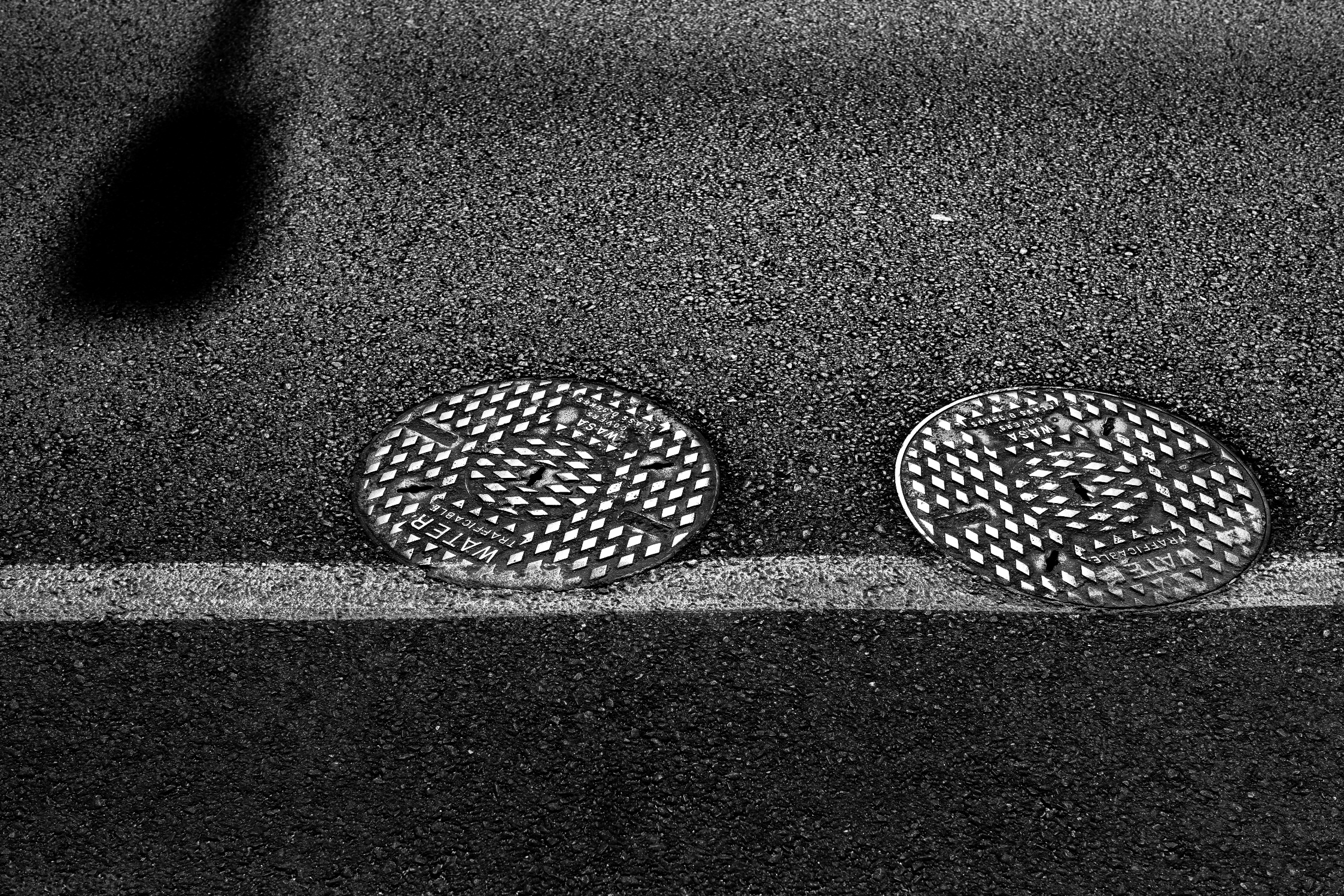 two manholes
